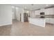 Modern kitchen with stainless steel appliances, granite countertops, and white cabinets at 3921 Radiant Mountain Dr, Plant City, FL 33565