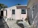 Exterior rear of home with door and windows at 365 145Th E Ave, Madeira Beach, FL 33708