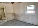 View of bedroom with ensuite bath and window with natural light at 365 145Th E Ave, Madeira Beach, FL 33708