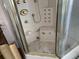 A close-up of shower showcasing adjustable jets and temperature settings at 365 145Th E Ave, Madeira Beach, FL 33708