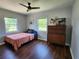 Bedroom featuring natural light, hardwood floors, and a neutral palette, creating a peaceful and inviting space at 420 61St S Ave, St Petersburg, FL 33705