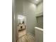 Upstairs bathroom featuring a vanity and tile floors at 7544 Red Mill Cir, New Port Richey, FL 34653