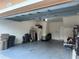 This garage has an automatic door, white walls, and plenty of room for parking at 7544 Red Mill Cir, New Port Richey, FL 34653