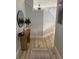 Neutral hallway with wood-look floors, offering a clean and modern design at 7544 Red Mill Cir, New Port Richey, FL 34653