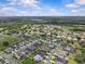 Scenic aerial view of a community highlighting the home's location near parks and natural landscapes at 10516 Tranquil Meadow Loop, Riverview, FL 33569
