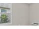 Bedroom with shuttered window and light-colored walls at 10516 Tranquil Meadow Loop, Riverview, FL 33569