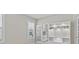 Bright living area featuring built-in shelves, a view of a window, and access to additional rooms at 10516 Tranquil Meadow Loop, Riverview, FL 33569