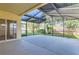 Spacious screened lanai provides a seamless transition to outdoor living at 4305 Balmoral Ct, Wesley Chapel, FL 33543