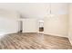 Spacious living area with an open layout and durable wood-look flooring at 4305 Balmoral Ct, Wesley Chapel, FL 33543