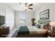 Staged bedroom with bed, night stands, closet and window, creating a relaxing ambiance at 11632 Castine St, New Port Richey, FL 34654