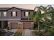 Modern two-story townhome with two-car garage and beautiful landscaping at 11632 Castine St, New Port Richey, FL 34654