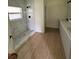 Modern bathroom showcases a stylish walk-in shower and double sink vanity at 353 Warrington Blvd, Port Charlotte, FL 33954