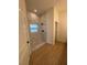 A modern bathroom with an elegant walk-in shower featuring beautiful tile and glass doors at 353 Warrington Blvd, Port Charlotte, FL 33954