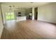 A contemporary kitchen with a spacious layout, stainless steel appliances, and a large center island at 353 Warrington Blvd, Port Charlotte, FL 33954