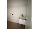 The laundry room is practical and has a sink to make laundry a breeze at 353 Warrington Blvd, Port Charlotte, FL 33954