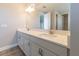 Bathroom boasts double vanity with white countertops and ample cabinet space at 4861 Antrim Dr, Sarasota, FL 34240