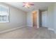 This bedroom boasts neutral walls, carpet flooring, and a closet for ample storage space at 4861 Antrim Dr, Sarasota, FL 34240