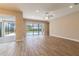 Open-concept living room with access to the pool and outdoor living spaces at 4861 Antrim Dr, Sarasota, FL 34240