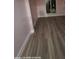 Bedroom featuring fresh floors and neutral paint at 6505 Oelsner St, New Port Richey, FL 34652