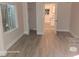 Bedroom featuring fresh floors and neutral paint at 6505 Oelsner St, New Port Richey, FL 34652