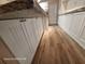 Elegant kitchen cabinets with granite countertops and stylish wood flooring at 6505 Oelsner St, New Port Richey, FL 34652