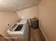 Laundry area with modern washer and dryer, plus a water heater for convenience at 6505 Oelsner St, New Port Richey, FL 34652