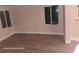Living room with new floors and natural light at 6505 Oelsner St, New Port Richey, FL 34652