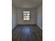 This simple bedroom has new vinyl flooring, is freshly painted and offers a spacious and simple design at 8612 N Alaska St, Tampa, FL 33604