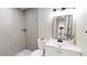 Stylishly renovated bathroom features a modern vanity, shower with tile, and contemporary fixtures at 2456 S 17Th S Ave, St Petersburg, FL 33712