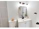 Bathroom featuring updated vanity, square mirror, stylish fixtures, and walk-in shower at 2456 S 17Th S Ave, St Petersburg, FL 33712