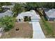 Aerial view of the home and front yard showing the landscaping at 7337 Cone Shell Dr, Spring Hill, FL 34607