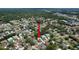 Scenic aerial view of a residential neighborhood, highlighting the proximity to nearby amenities at 7337 Cone Shell Dr, Spring Hill, FL 34607