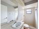 Bathroom with a single sink vanity, and shower with tiled walls at 7337 Cone Shell Dr, Spring Hill, FL 34607