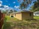 Home exterior shows a well-maintained lawn and home at 7337 Cone Shell Dr, Spring Hill, FL 34607