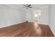 Bright living room with hardwood floors and ceiling fan at 2731 Penzance St, Palm Harbor, FL 34684