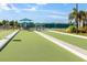 Enjoy a game of bocce ball on a meticulously maintained community court, surrounded by lush greenery at 13064 N Marsh Dr, Port Charlotte, FL 33953
