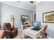 Office with a work desk, ergonomic chair, leather recliner, and neutral paint at 13064 N Marsh Dr, Port Charlotte, FL 33953