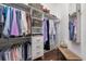 Walk-in closet with custom shelving, drawers, and ample storage space at 13064 N Marsh Dr, Port Charlotte, FL 33953