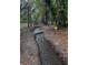 A stream flows through the property's wooded landscape, creating a tranquil atmosphere at 17380 Sweetwater Rd, Dade City, FL 33523