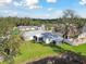Beautiful home with a private backyard, mature trees, a storage shed, and serene pond views at 3118 34Th Avenue E Dr, Bradenton, FL 34208