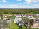 Aerial view of a neighborhood with a pond at 3118 34Th Avenue E Dr, Bradenton, FL 34208