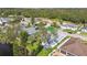 Charming neighborhood with tree-lined streets, well-maintained lawns, and access to nearby wooded areas and a pond at 3118 34Th Avenue E Dr, Bradenton, FL 34208