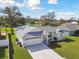 Beautiful exterior of a well-kept home with a long driveway and attached garage at 3118 34Th Avenue E Dr, Bradenton, FL 34208