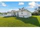 Well-kept single-story home with a lush lawn, a two-car garage, and inviting curb appeal at 3118 34Th Avenue E Dr, Bradenton, FL 34208