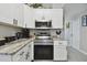 Bright, clean kitchen with stainless steel oven, and attractive countertops at 3118 34Th Avenue E Dr, Bradenton, FL 34208