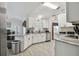 Bright kitchen features stainless steel appliances and attractive countertops at 3118 34Th Avenue E Dr, Bradenton, FL 34208