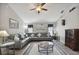 Spacious living room features a sectional sofa, and stylish decor at 3118 34Th Avenue E Dr, Bradenton, FL 34208