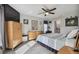 Well-lit main bedroom featuring a ceiling fan and neutral-colored walls and décor at 3118 34Th Avenue E Dr, Bradenton, FL 34208