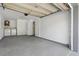 Spacious garage featuring a laundry area with washer and dryer hookups and access to the home's interior at 7214 Oakwood Dr, New Port Richey, FL 34652