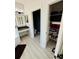 Bright bathroom with stylish fixtures, vanity area, and walk-in closet, designed for comfort and convenience at 18018 Malakai Isle Dr, Tampa, FL 33647
